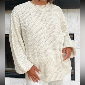 Oversized cream sweater from Grey Bandit.